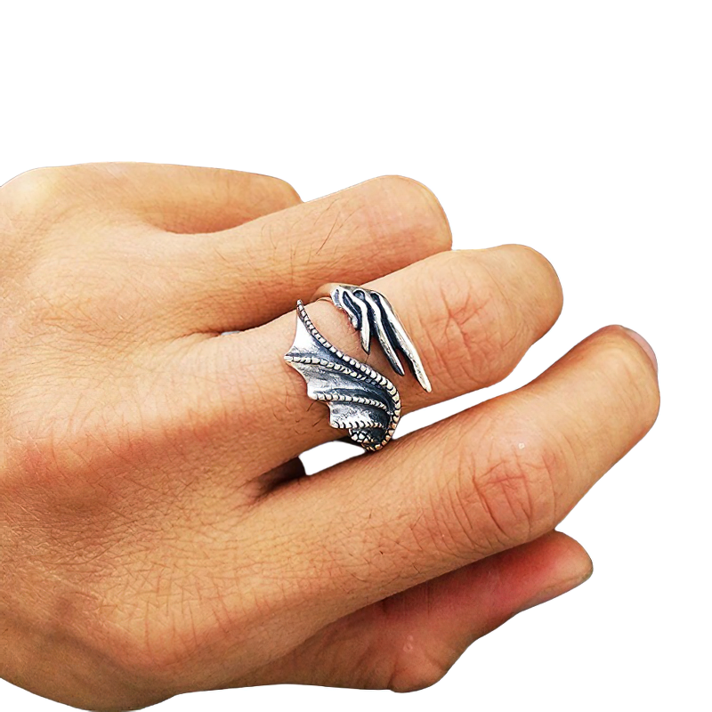 Unisex adjustable ring featuring a gothic feather wing design, crafted from 925 sterling silver, showcased on a hand.