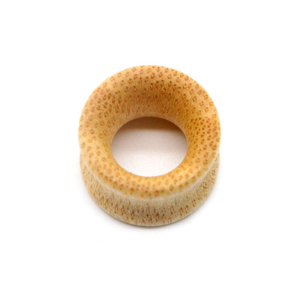 Bamboo wood ear plug jewelry gauge expander with hollow design for stylish accessories.