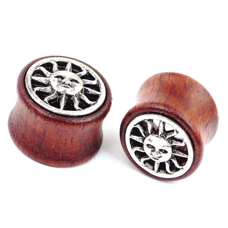 Bamboo wood ear plugs with sun design, stylish jewelry gauges for unique ear stretching.