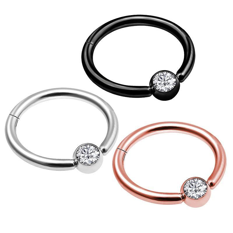 Double layers steel clicker segment nose hoop rings in black, silver, and rose gold with crystal decoration.