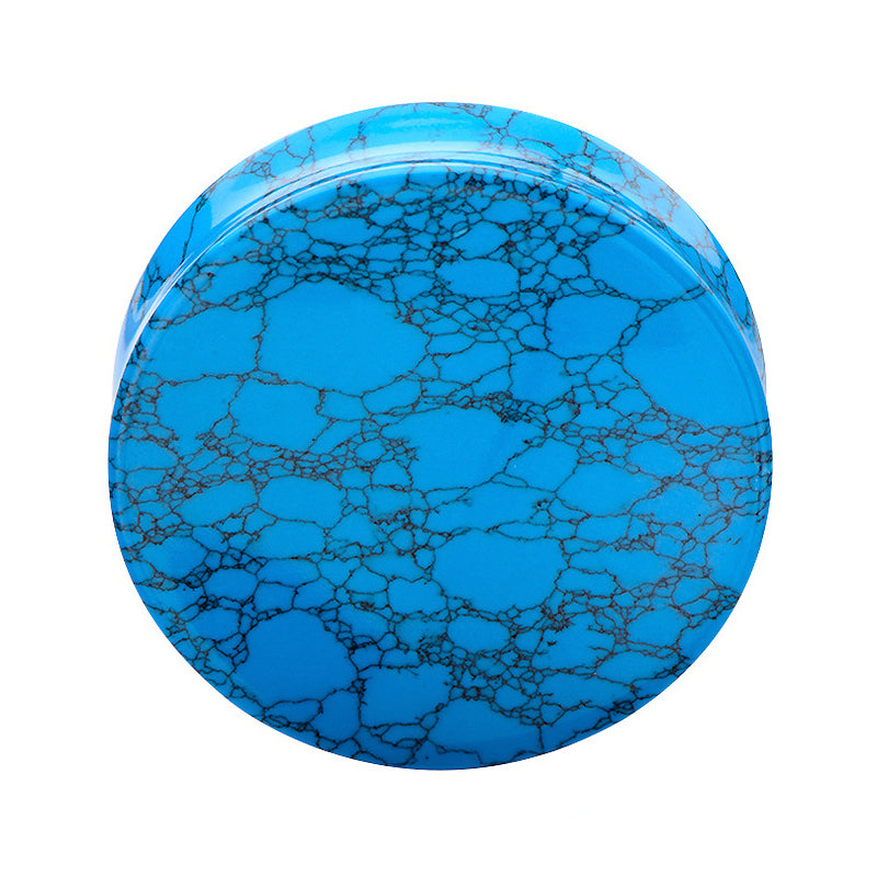 Blue turquoise stone ear plug with unique marbled pattern for ear stretching, perfect for stylish body jewelry.