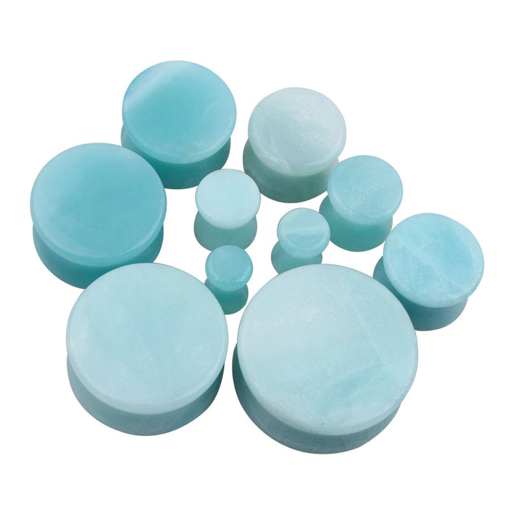Collection of amazonite stone ear plugs and gauges in various sizes for stylish body jewelry.