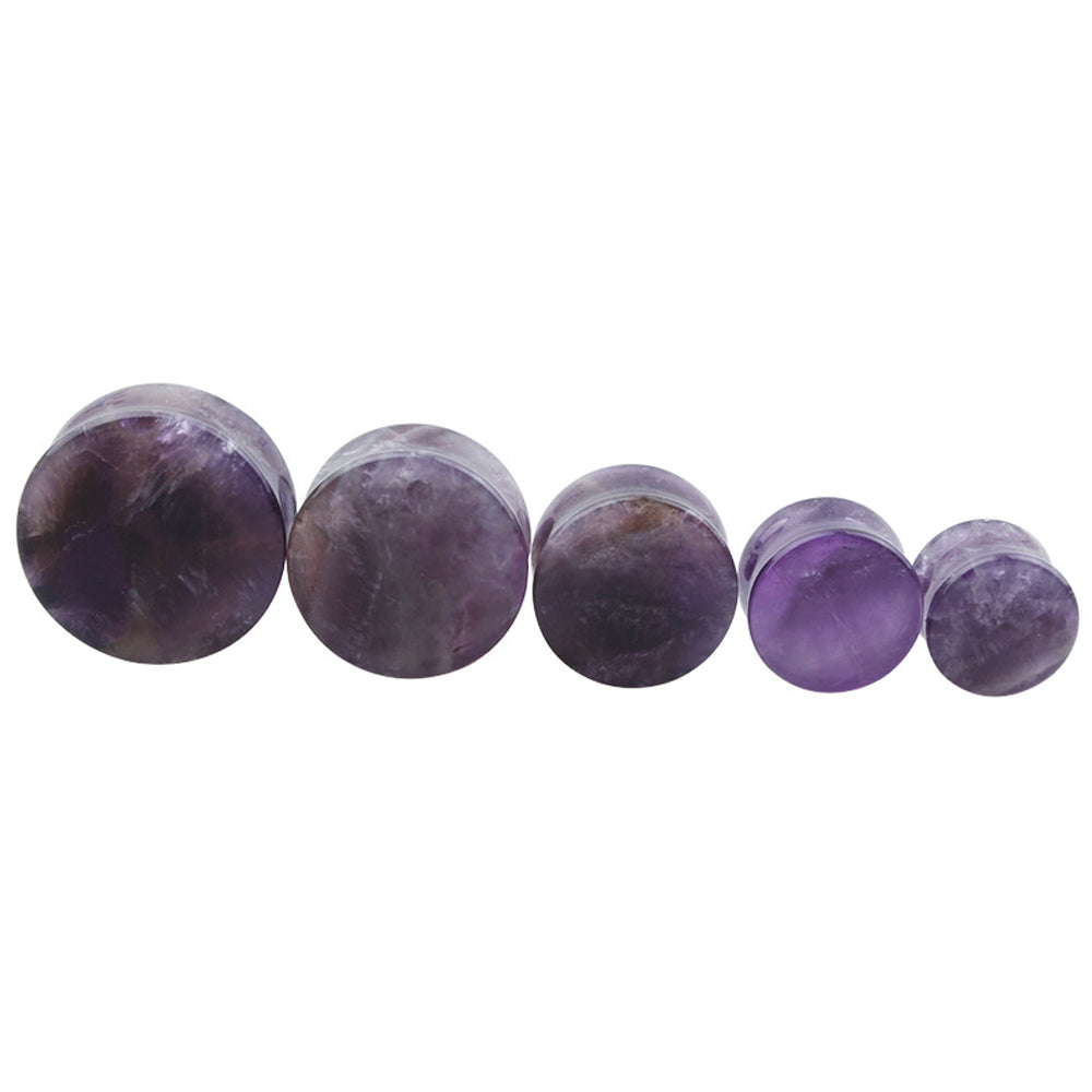 Body jewelry set of amethyst stone ear plugs gauges in various sizes for comfortable stretching and trendy accessory styling.