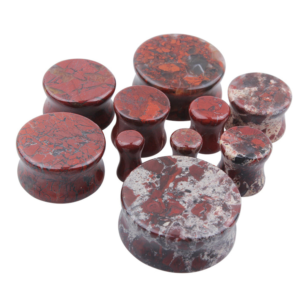 Stylish stone ear plugs and gauges in bloodstone design for unique body jewelry accessories.