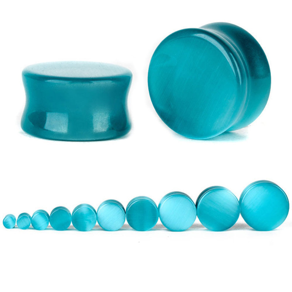 Blue cats eye stone ear plugs in various sizes, perfect for body jewelry enthusiasts and alternative fashion lovers.