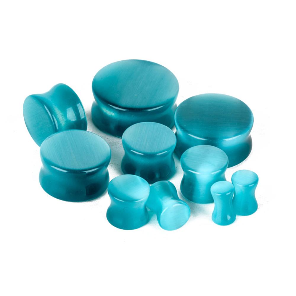 Blue cats eye stone ear plugs and gauges for piercings, perfect for stylish body jewelry and comfortable stretching.