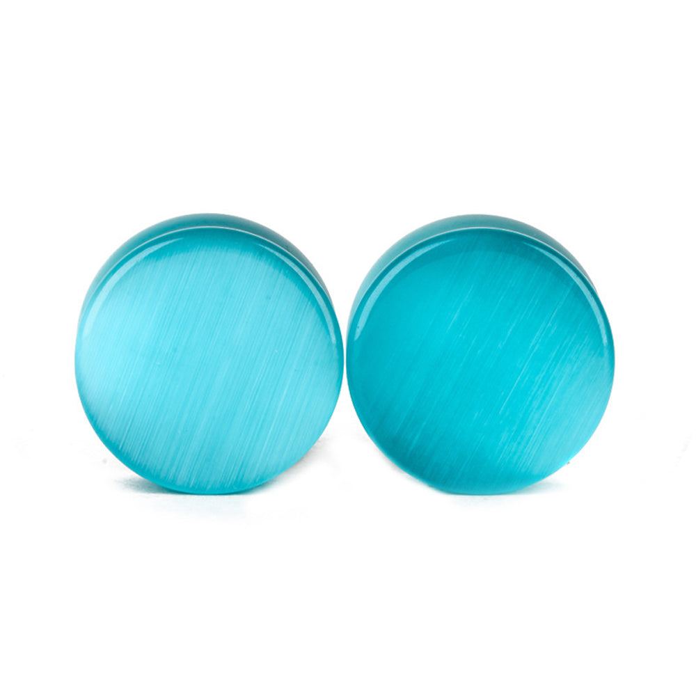 Blue cats eye stone ear plugs, sleek design, perfect for gauging and body jewelry lovers, stylish and unique accessory.