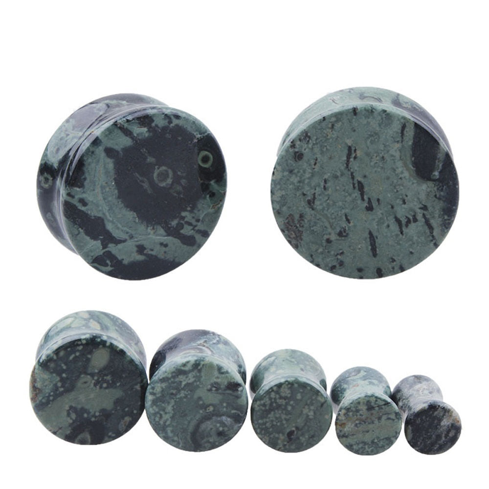 1PC green eye stone ear plugs, trendy round expanders for body jewelry enthusiasts, perfect for unisex styling.