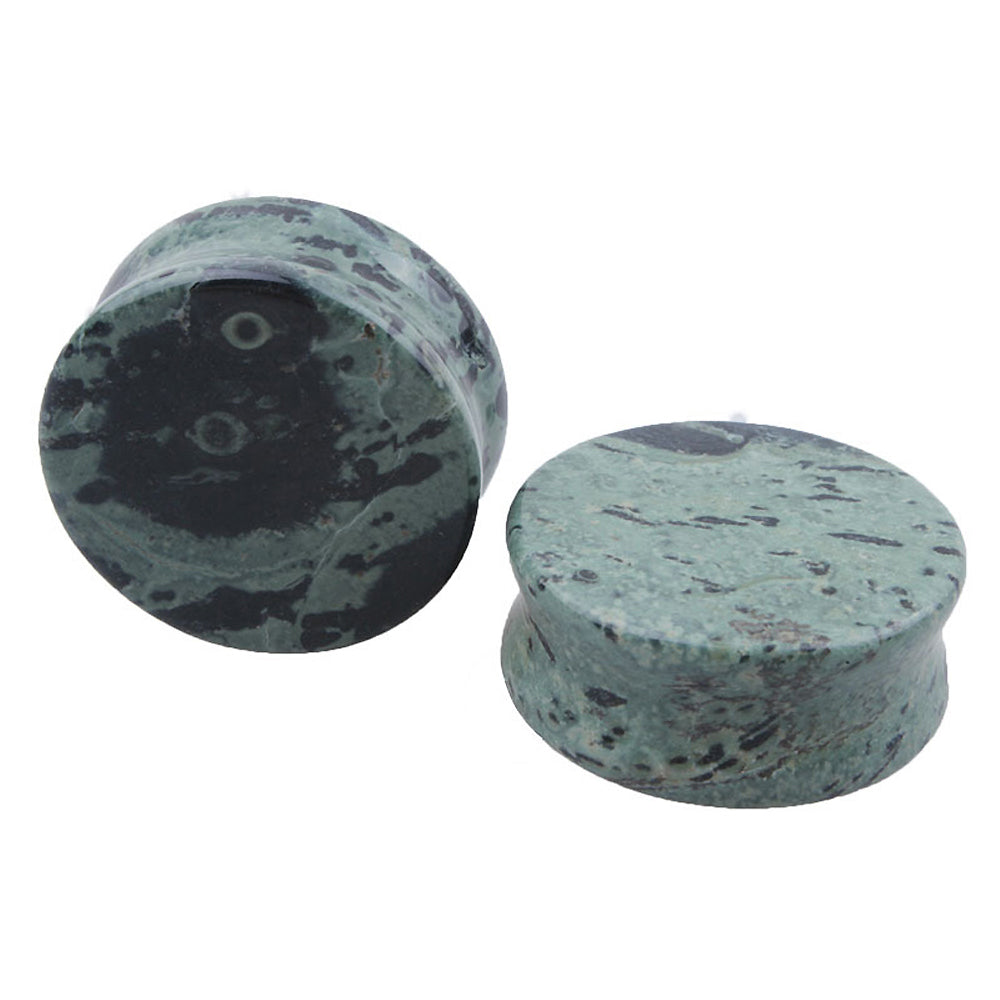 Green eye stone ear plugs, trendy stone expanders, unisex body jewelry for ear piercing and fashionable accessorizing.