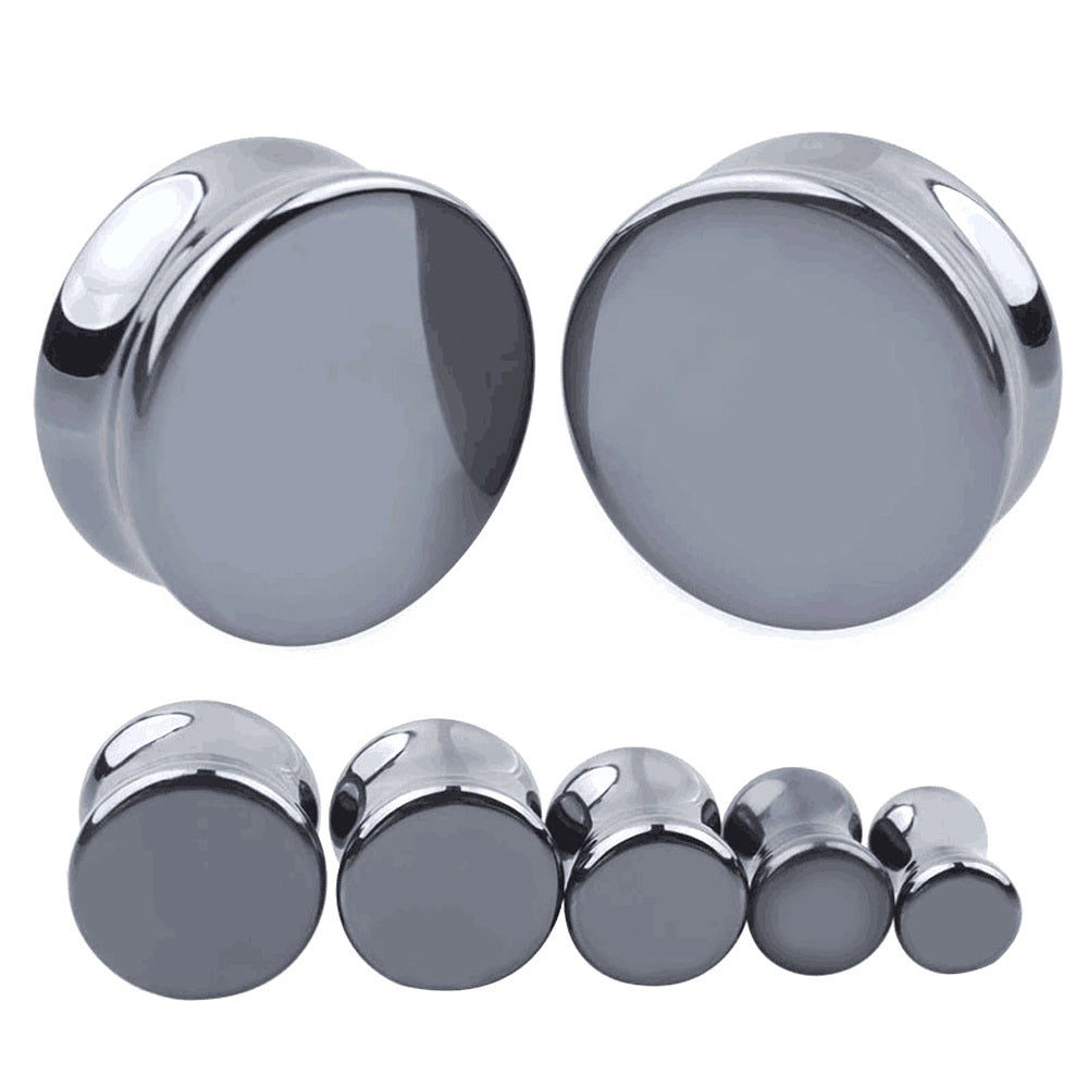 Stylish hematite stone ear plugs and gauges in various sizes, perfect for trendy body jewelry enthusiasts.