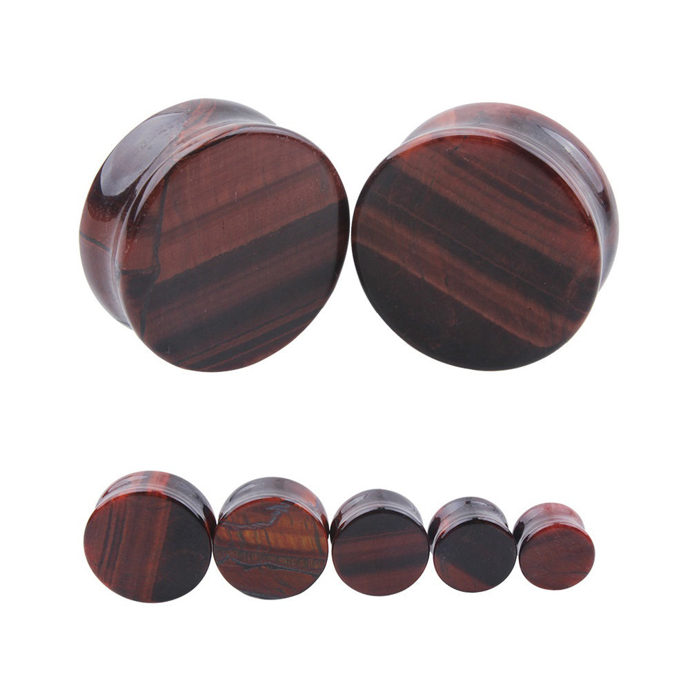 Red tigerite stone ear plugs showcasing a shiny, polished finish, perfect for unisex body jewelry and piercings.