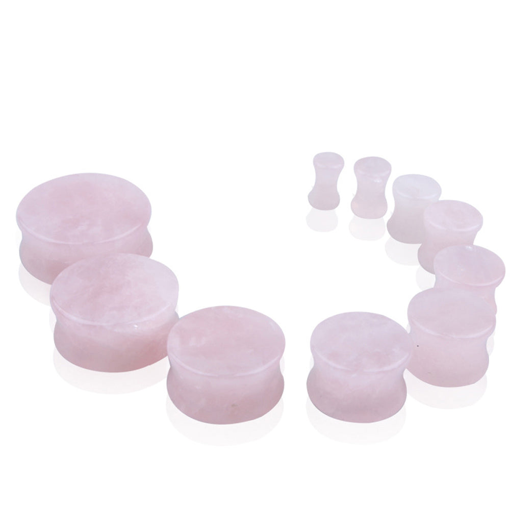 Rose quartz stone ear plugs in various sizes, trendy body jewelry for gauges and piercings.
