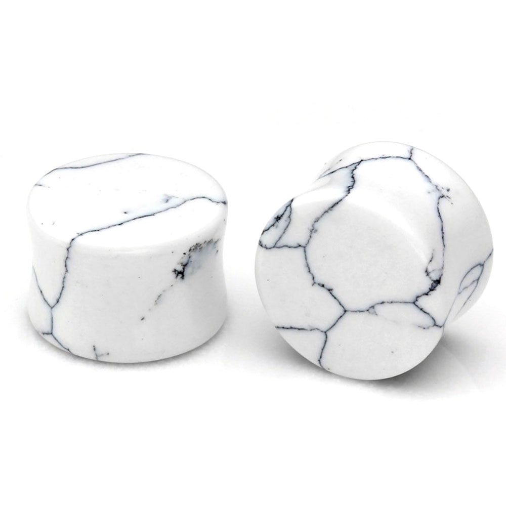 Stylish white turquoise stone ear plugs with black veining, perfect for stretching piercings and trendy body jewelry.