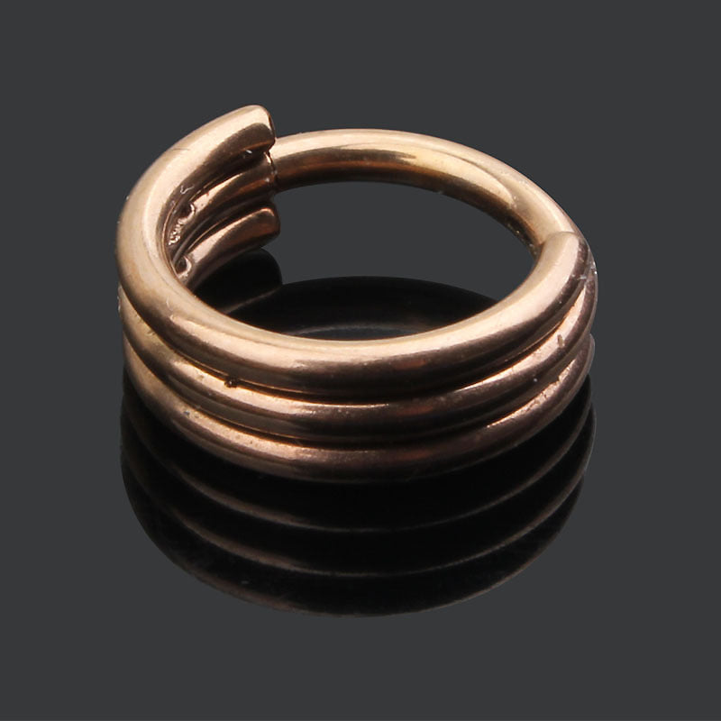 Triple layers stainless steel clicker hoop ring in gold, perfect for nose or ear piercings, unisex rock accessories.