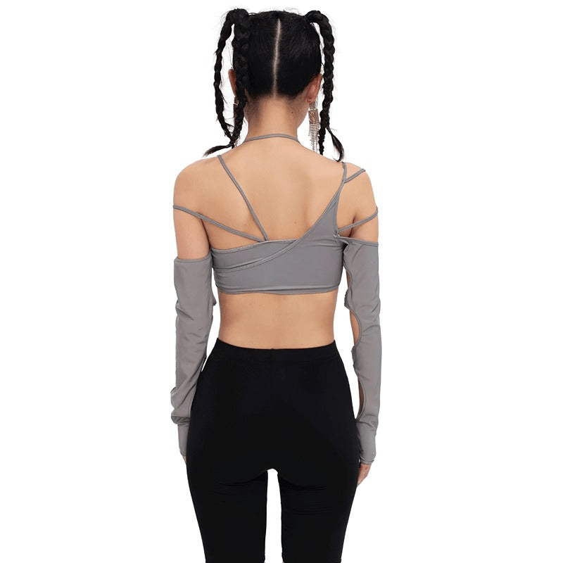 Stylish women's cut out long sleeve crop top in gray, showcasing an asymmetrical design and trendy back view.