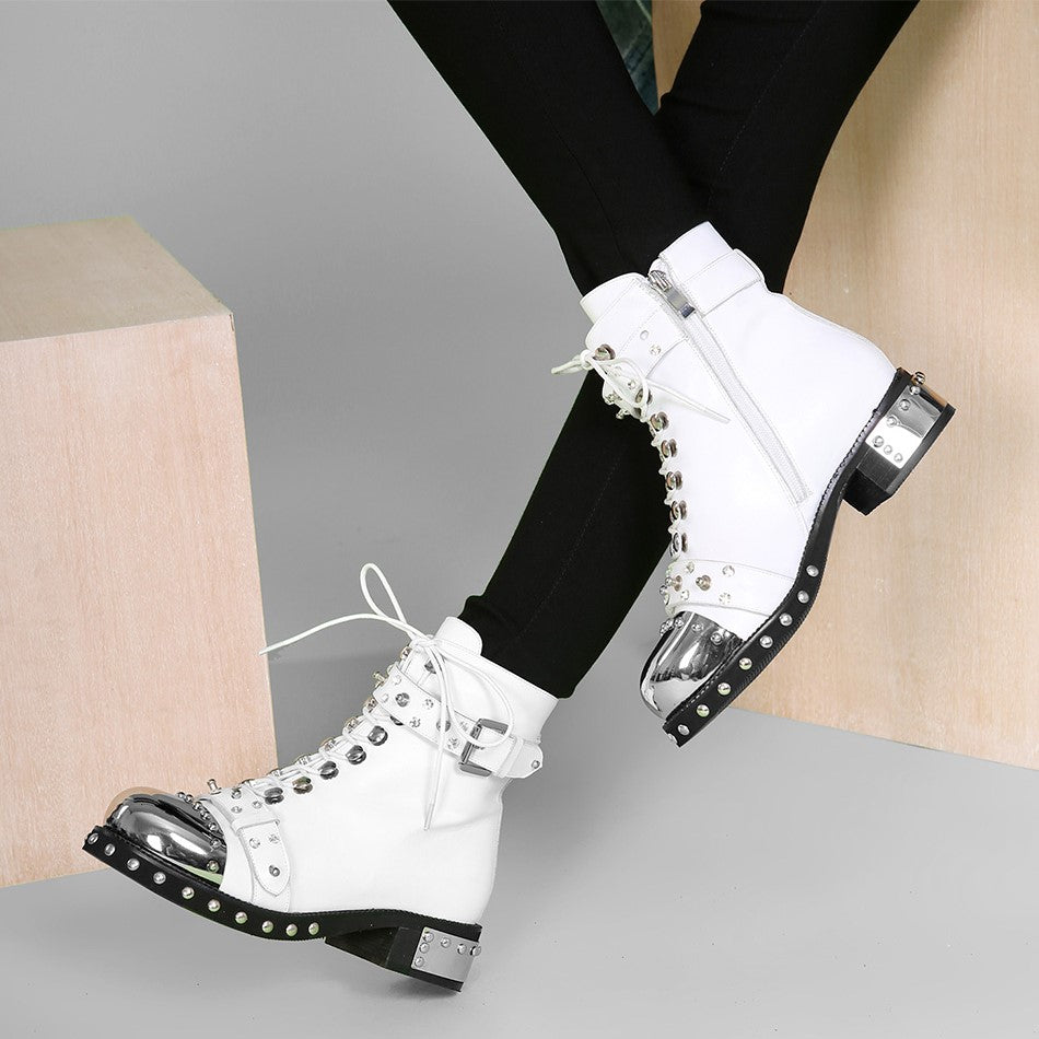 White genuine leather punk rock boots with studs and shiny toe cap, featuring zippers and decorative rivets.