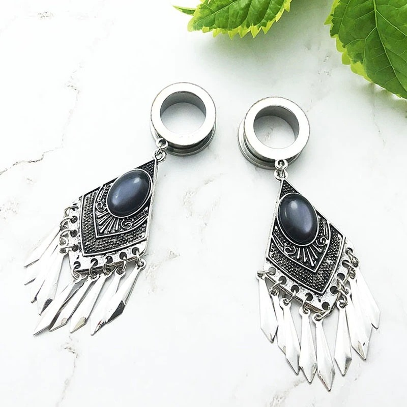 Elegant women's gothic stainless steel earrings with vintage design and hanging embellishments.