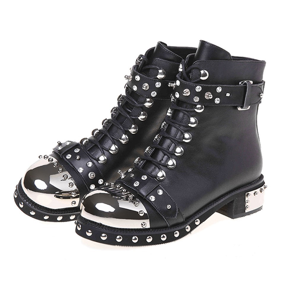 Genuine leather punk rock ankle boots with studs and metallic toe caps for women, stylish and edgy biker boots.