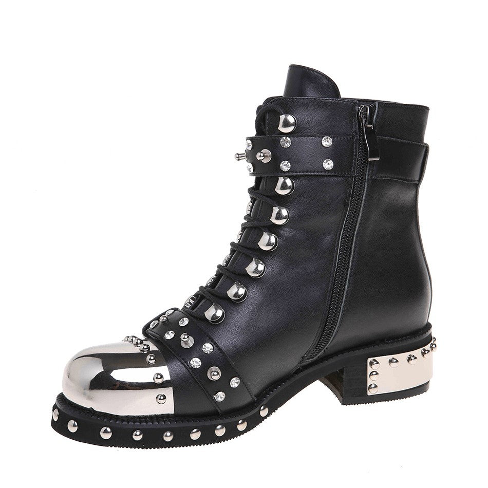 Genuine leather punk rock ankle boots with studs and silver accents, featuring zippers and comfortable flat soles.