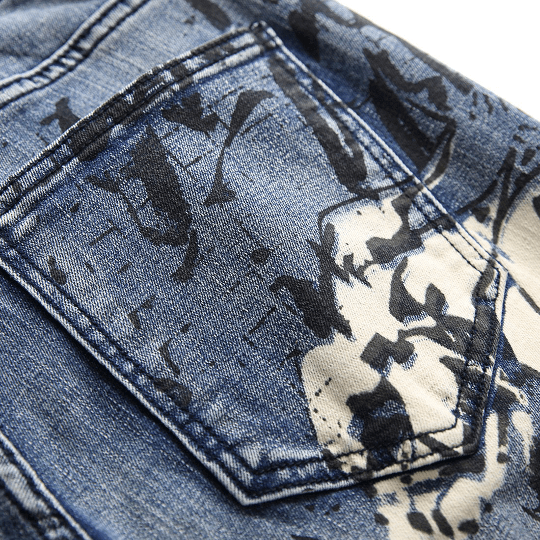 Close-up of 3D pattern denim pants showcasing unique design and textured fabric details in punk style.