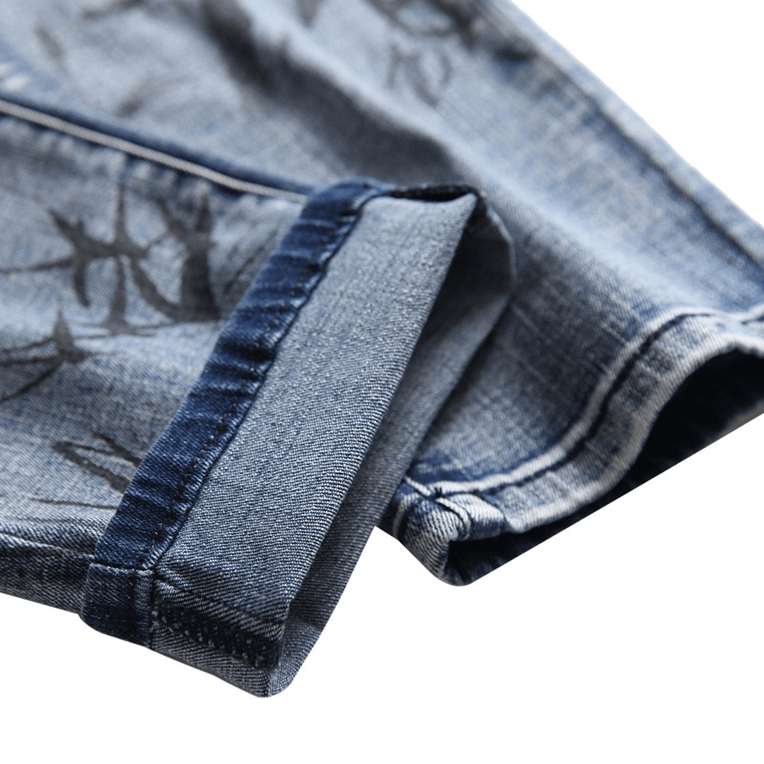 Close-up of the cuff of 3D pattern denim pants showcasing punk style and quality fabric.