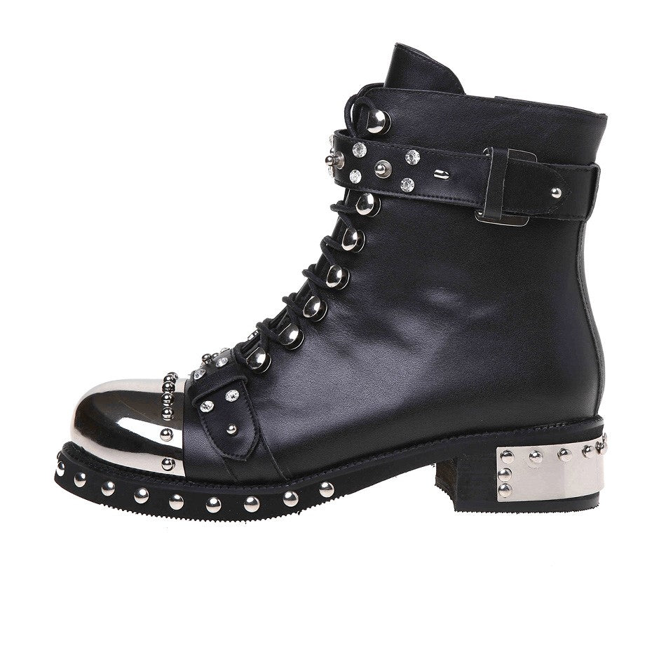 Black women's punk rock ankle boots with rivets, chains, and metal details for a stylish biker look.