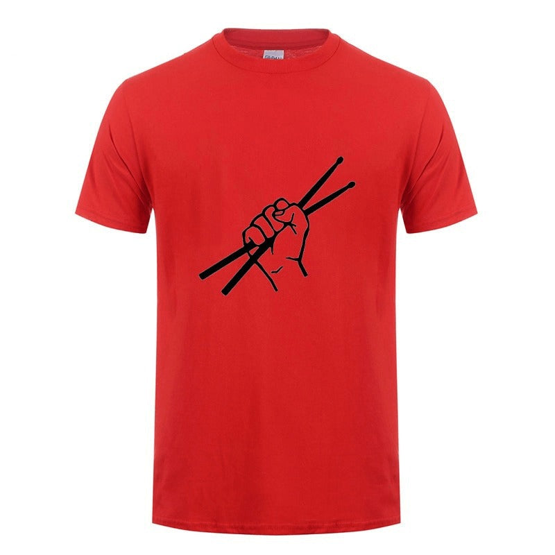 Red cotton t-shirt featuring a drummer's fist holding drumsticks, perfect for music lovers and rock enthusiasts.
