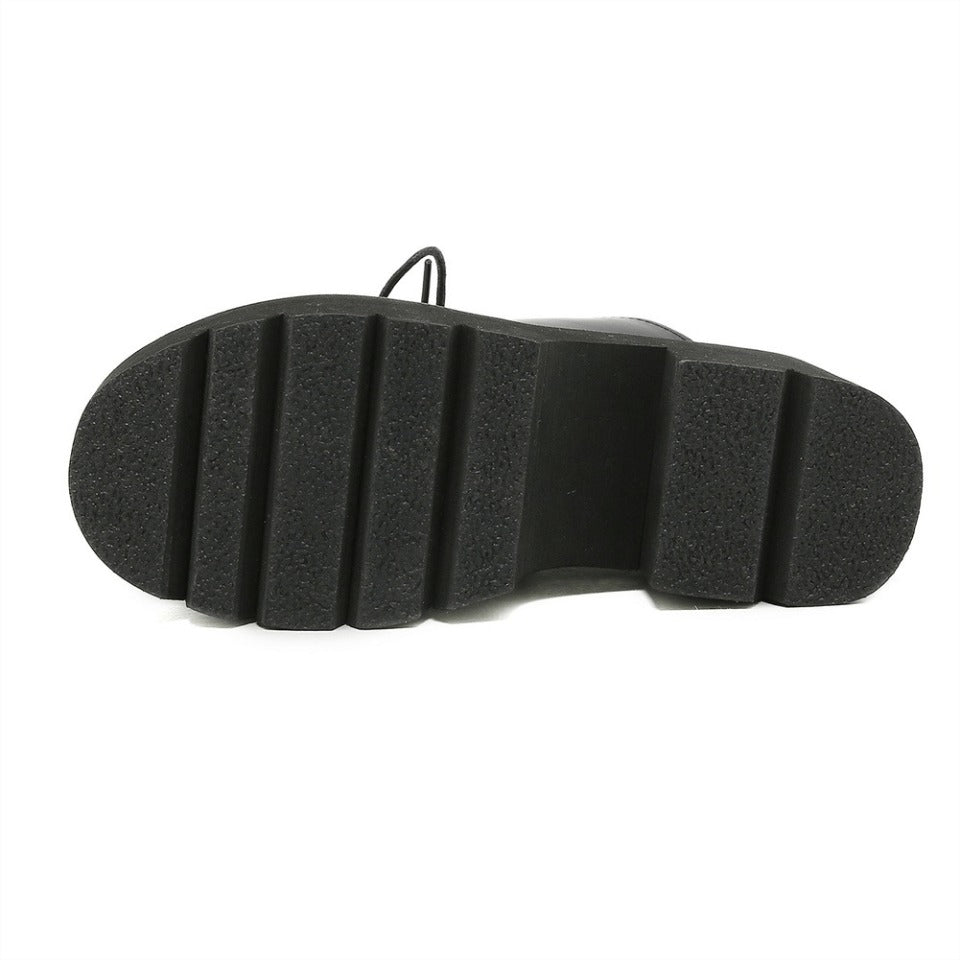 Sole of women's PU leather open-toe mules sandals featuring a stylish black platform design.