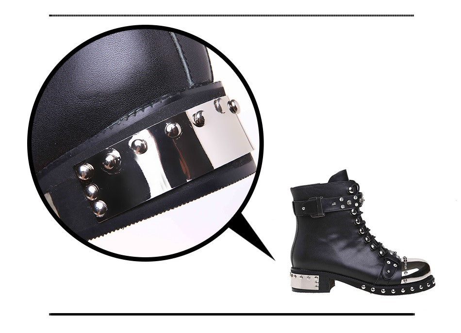 Close-up of women's genuine leather punk rock boots featuring rivets and a metallic detail on square heel.