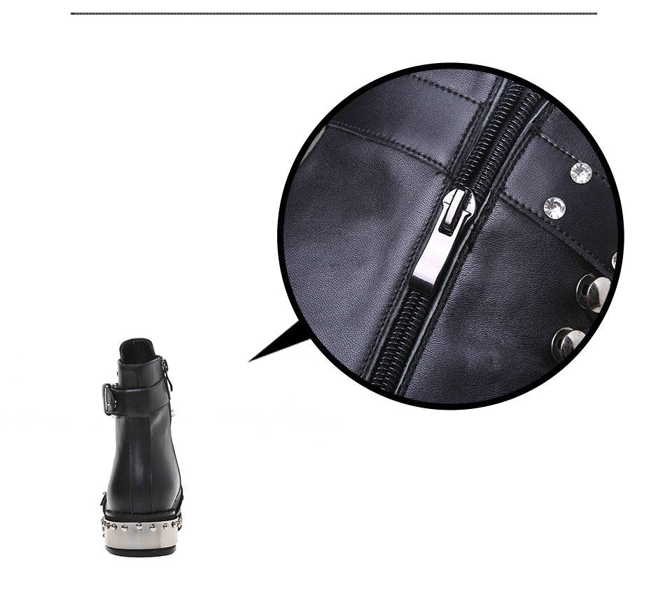 Close-up of women's punk rock ankle boots highlighting the zipper and studded design for stylish comfort.