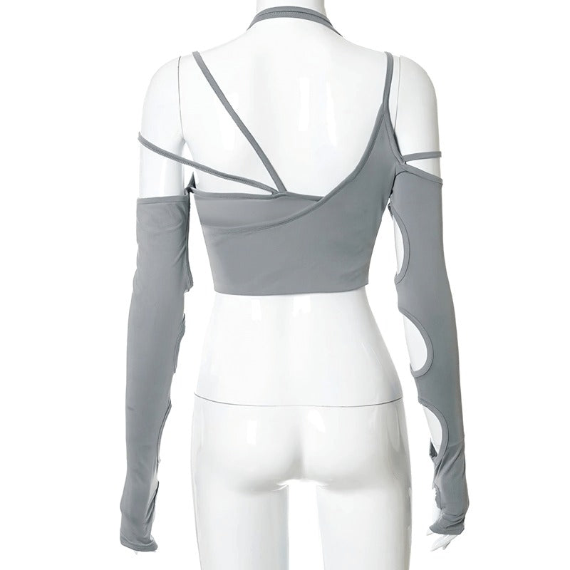 Back view of women's sexy cut out long sleeve crop top in gray, showcasing asymmetrical design and stylish cut outs.