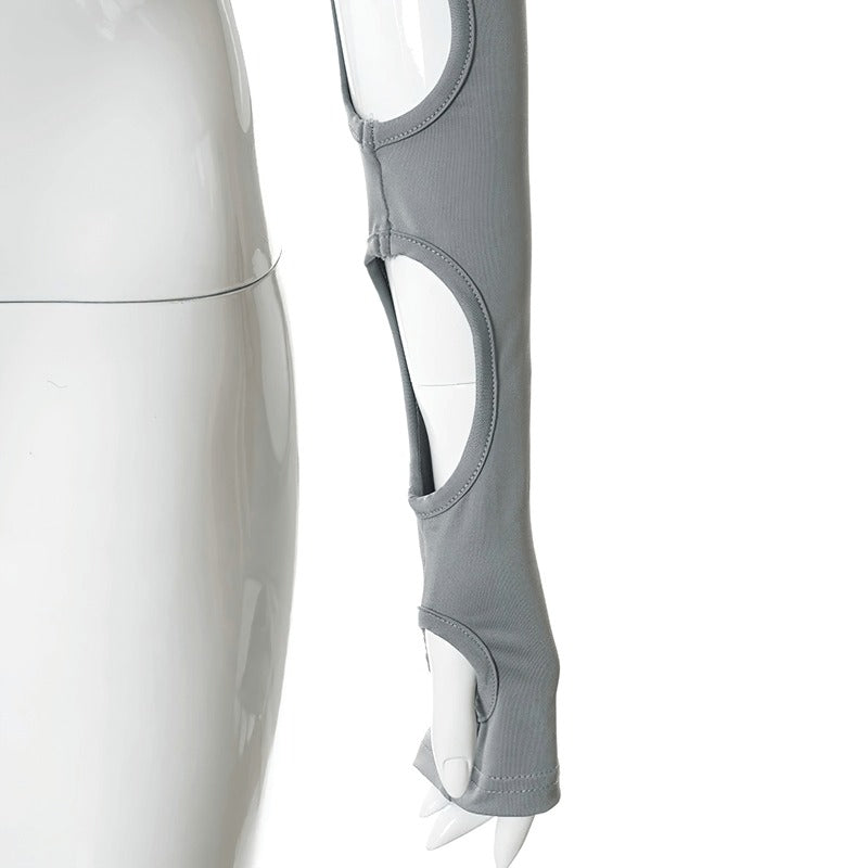 Women's stylish cut out long sleeve in gray featuring unique asymmetrical design and finger holes for trendy alternative look.