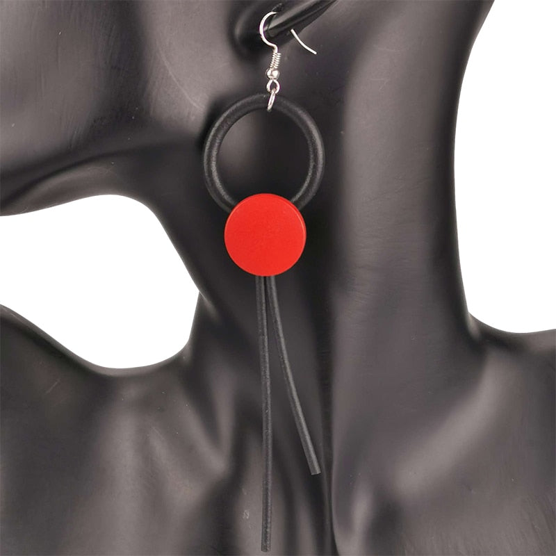 Gothic style long earrings featuring red circular design and black rubber accents, perfect for stylish women.