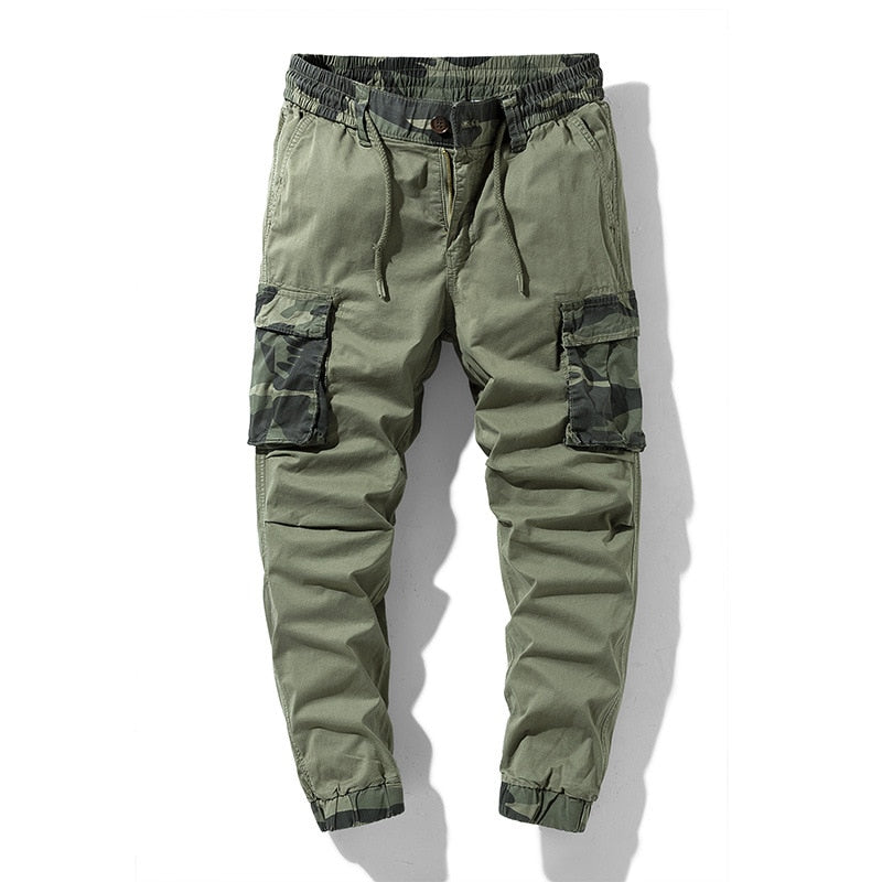 Men's olive green joggers with camouflage cargo pockets and elastic waist for comfortable streetwear style.