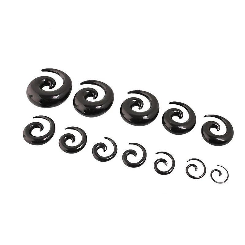 Assorted black acrylic spiral taper ear stretchers in various sizes, perfect for adding rock style to your look.