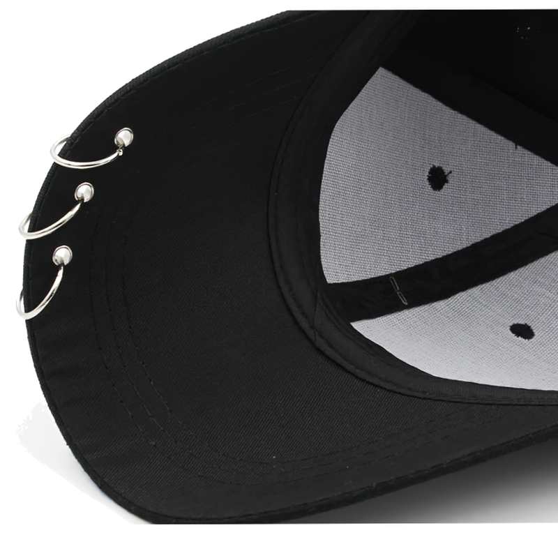 Inside view of adjustable unisex baseball cap with ring piercing, showcasing punk style and cotton comfort.