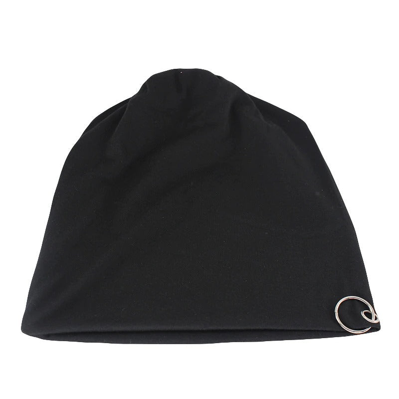 Black unisex beanie with metal hoop, perfect for minimalistic winter fashion. Warm and stylish, available in multiple colors.
