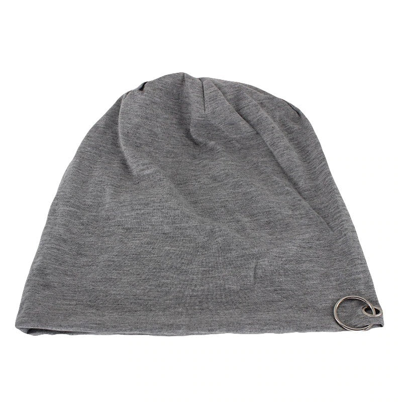 Gray minimalistic beanie with metal ring for unisex autumn and winter fashion.