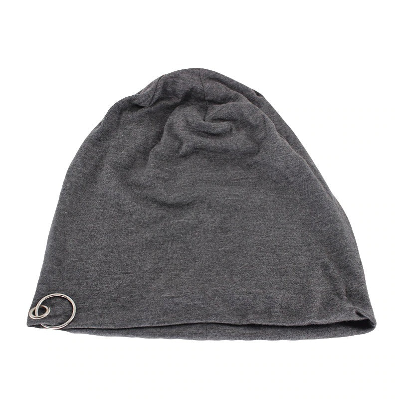 Dark grey unisex beanie with metal ring, perfect for minimalistic autumn and winter fashion. Stay warm and stylish!
