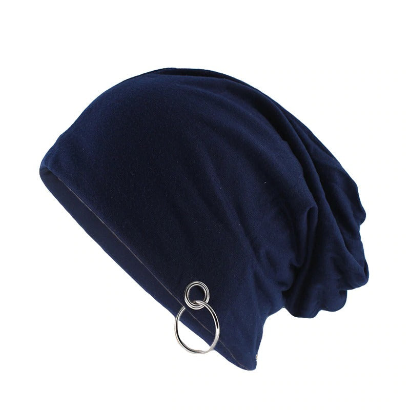Navy blue minimalistic beanie with metal ring, perfect for autumn and winter fashion, warm and stylish for all.