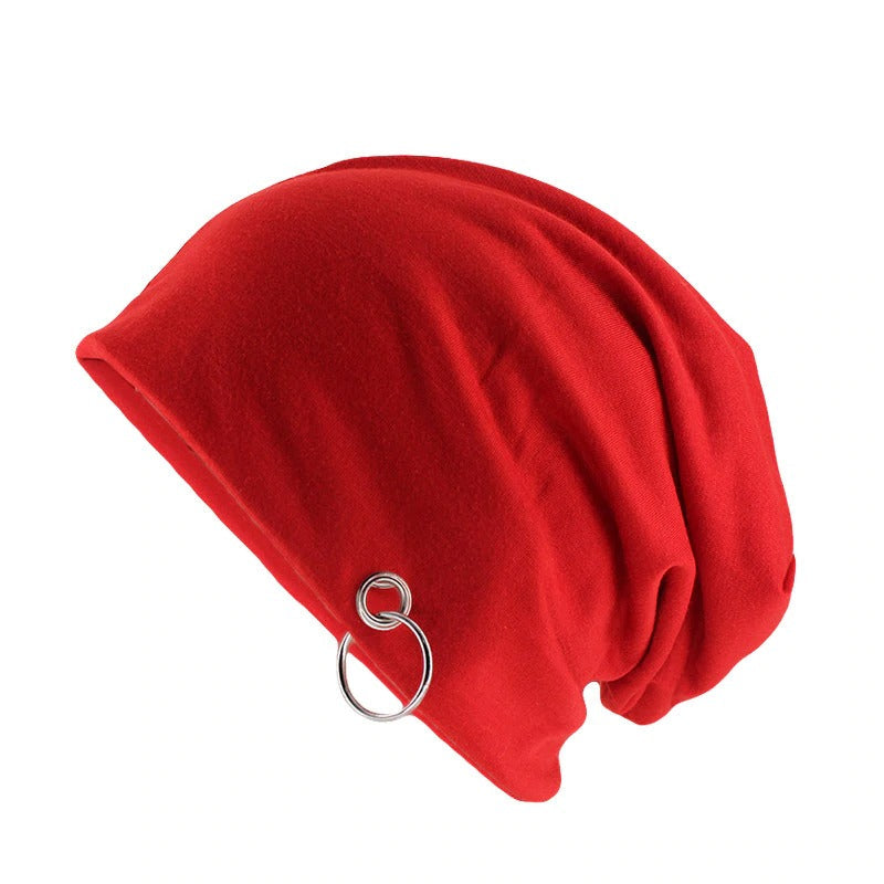 Bright red unisex beanie with a metal ring, perfect for minimalistic autumn and winter fashion.