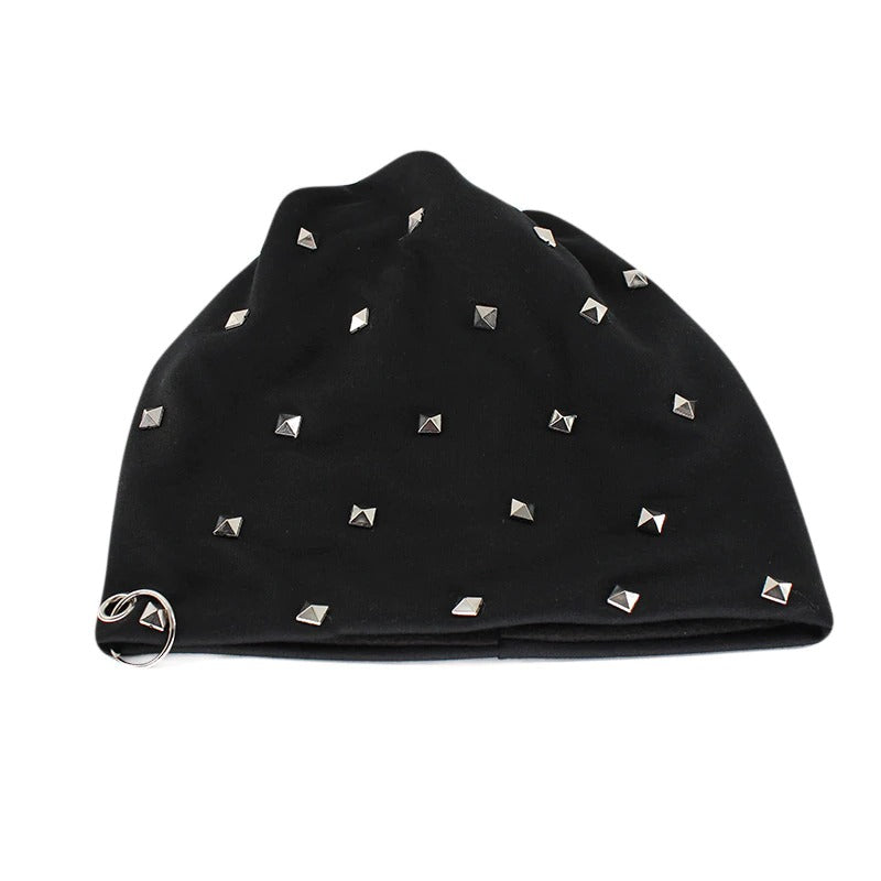 Black unisex beanie with metal studs and a hoop, perfect for alternative winter fashion.
