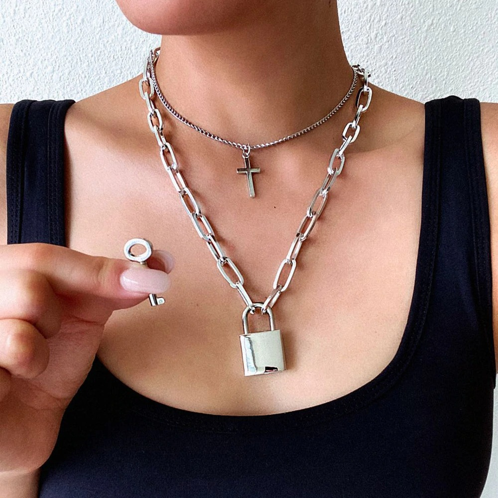 Aesthetic punk chain necklace with square lock and cross pendant, grunge goth style accessory.