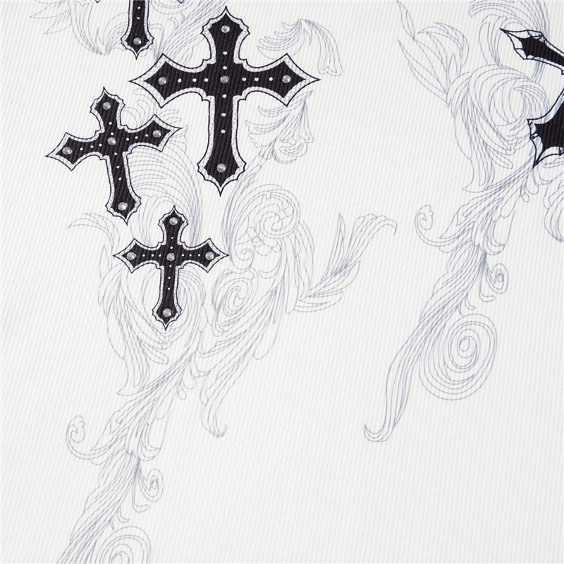 Close-up of black cross wings print on a ribbed fabric, perfect for a stylish women's long sleeve top.