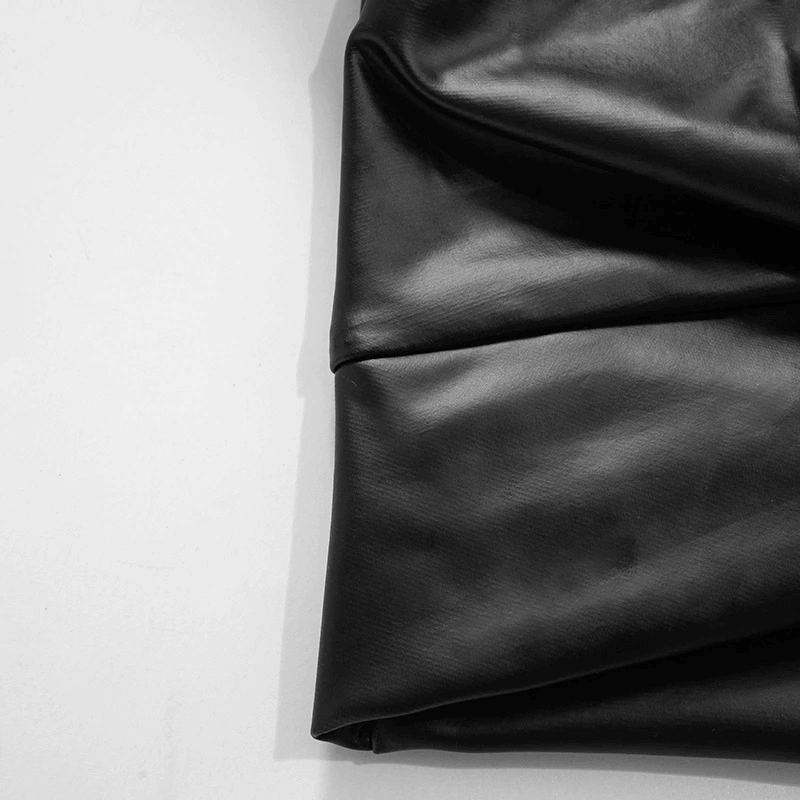 Close-up of sleek black fabric, showcasing its smooth texture and elegance for stylish apparel.