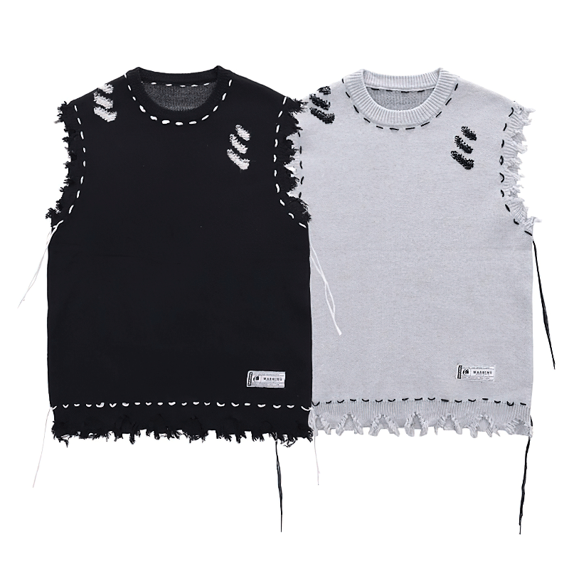 Aesthetic tattered fringed knitted vest in black and gray, showcasing vintage oversized sleeveless sweater design.