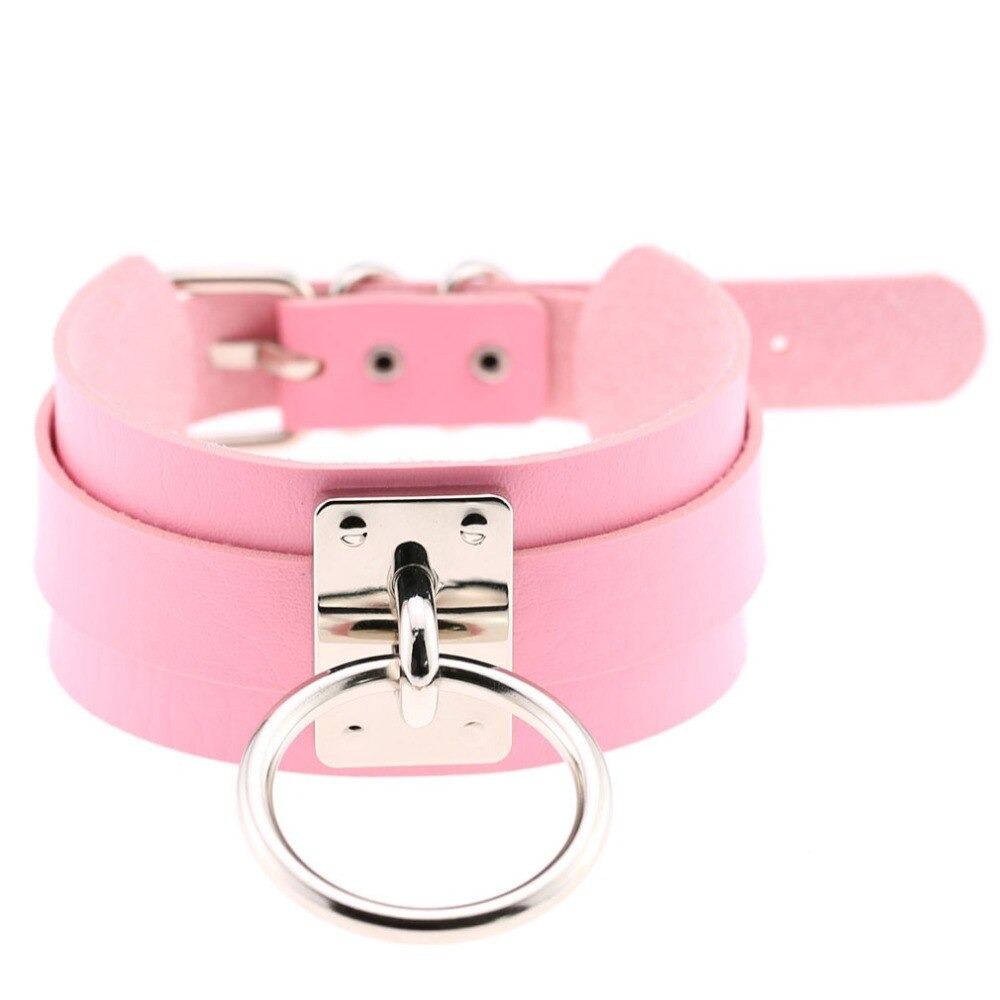 Trendy pink vegan leather choker collar with metal ring, perfect for punk style outfits.
