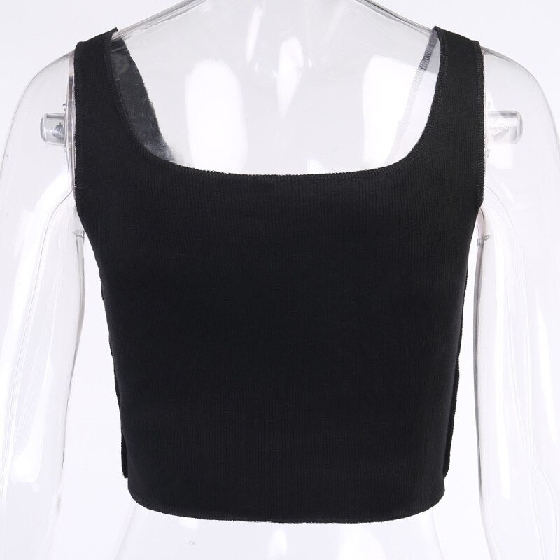 Stylish black crop top with a square neckline, perfect for a punk-inspired outfit.