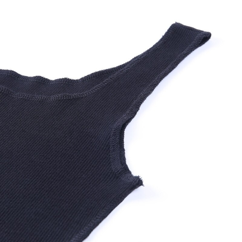 Close-up of black tank top with ribbed texture, showcasing trendy punk style and unique neckline details.