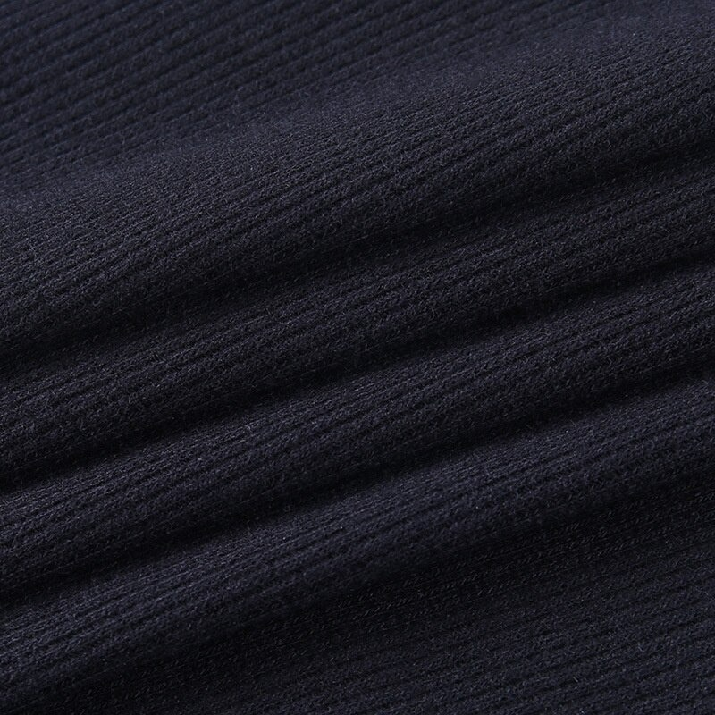 Close-up of soft, dark navy fabric showcasing ribbed texture, ideal for chic punk-style tank tops.